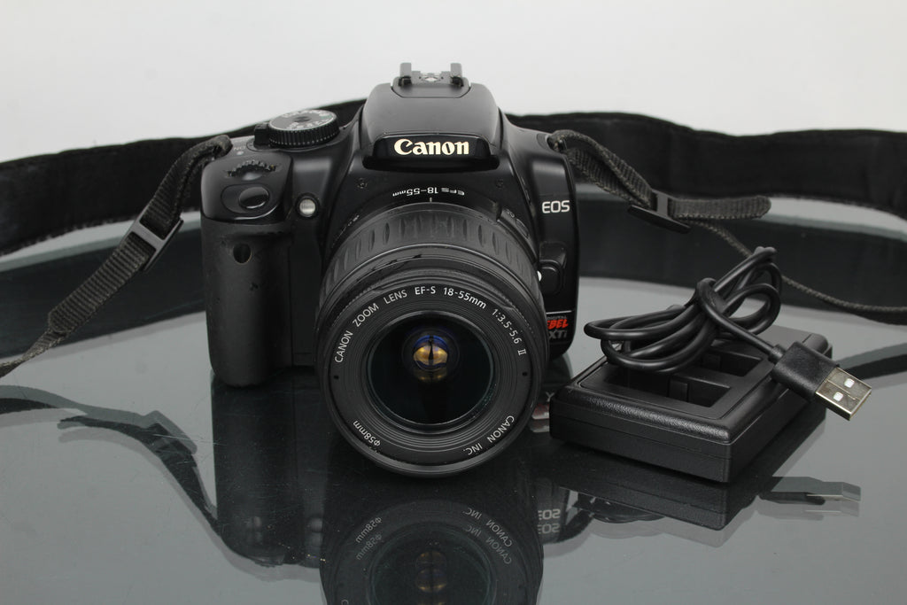 Canon EOS Rebel XTI + obiettivo Canon EF-S 18-55mm 1:3.5-5.6