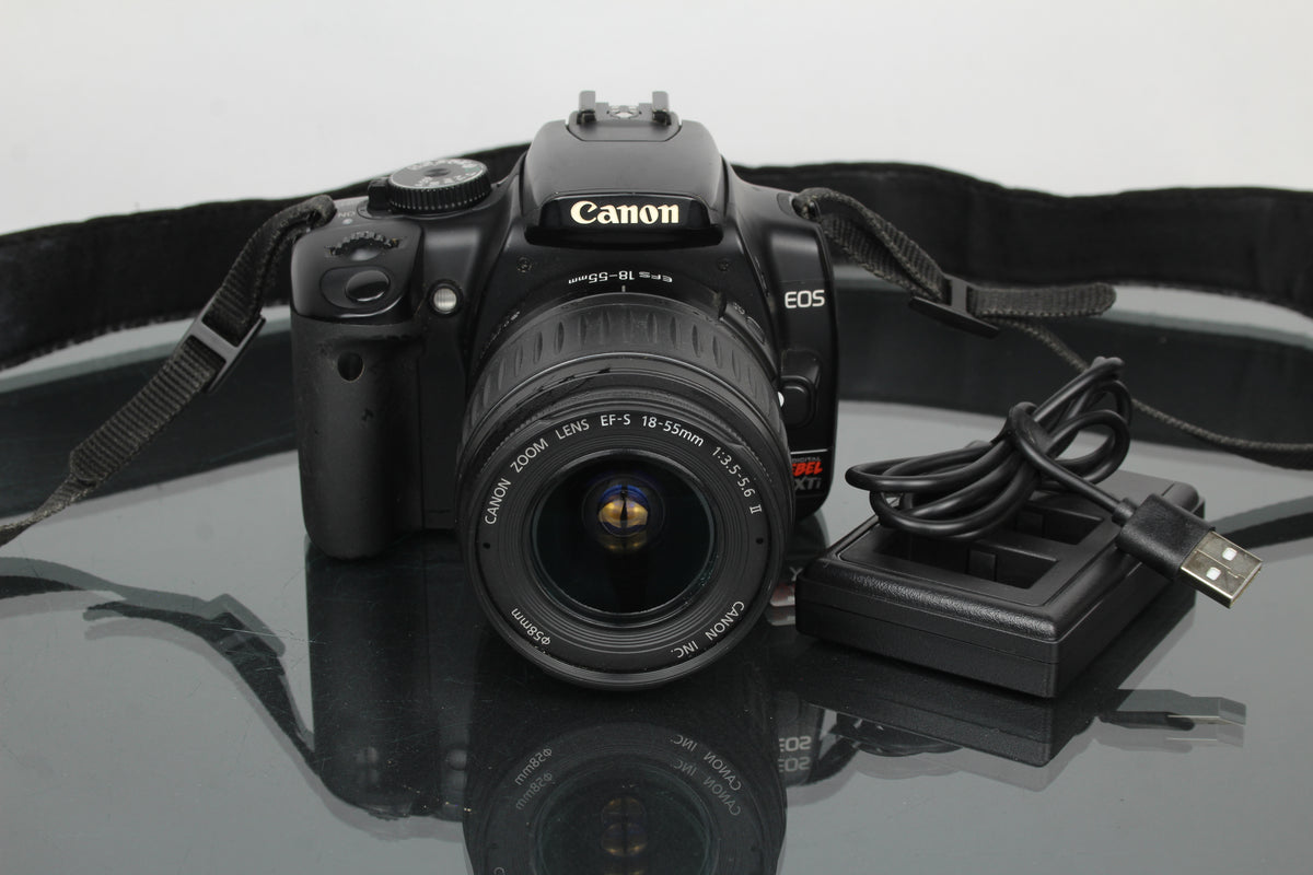 Canon EOS Rebel XTI + obiettivo Canon EF-S 18-55mm 1:3.5-5.6