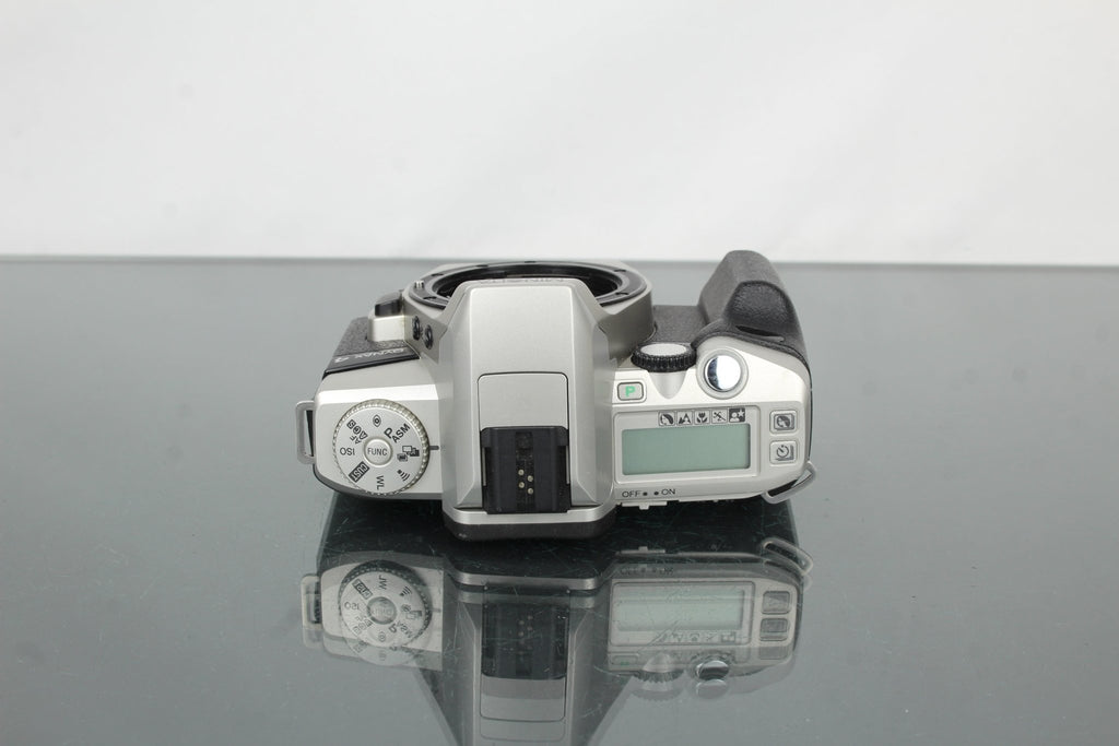 Minolta Dynax 4 - Dutch|Thrift